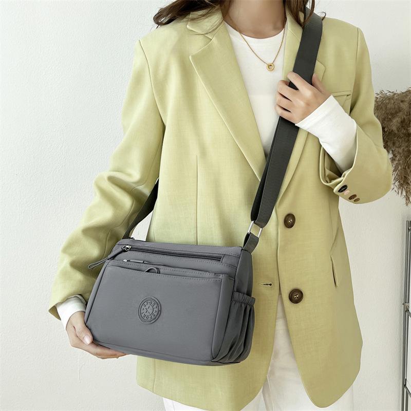 2026 Women's Multi-Pocket Oxford Shoulder Bag: Stylish, Layered, and Simple Crossbody for Casual Commuting