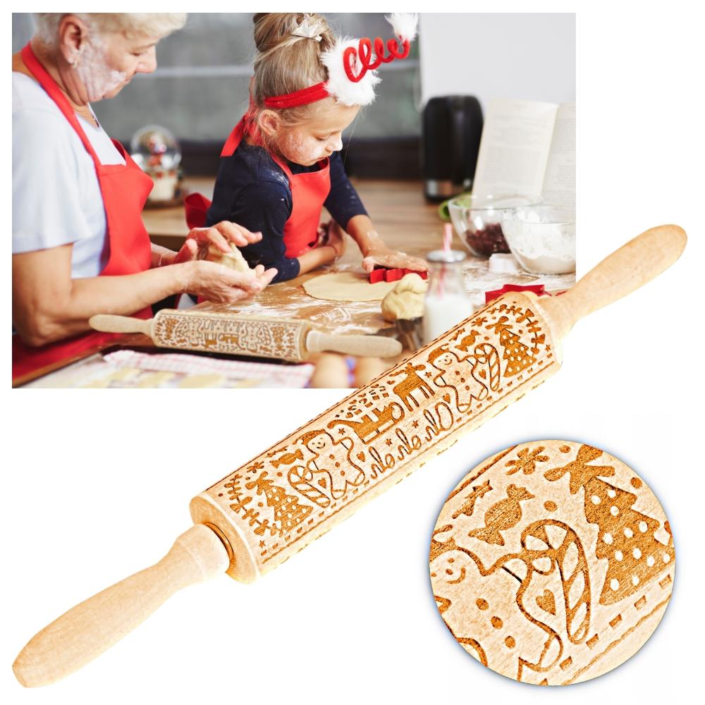 Wooden rolling pin with Christmas patterns and decorative engraving