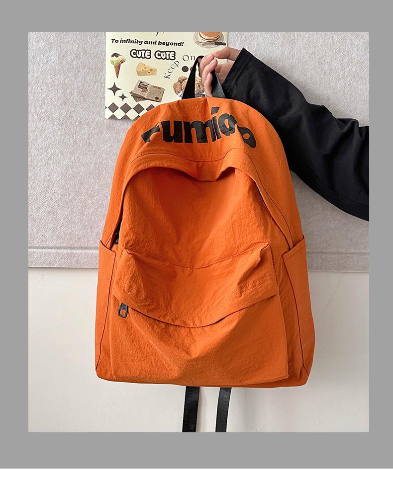 Lightweight Minimalist Backpack for Female Students: Versatile Double-Shoulder Bag for School and Travel.