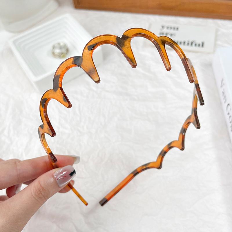 

Высококачественная двухсторонняя волнистая повязка на голову для универсальной укладки и умывания лица