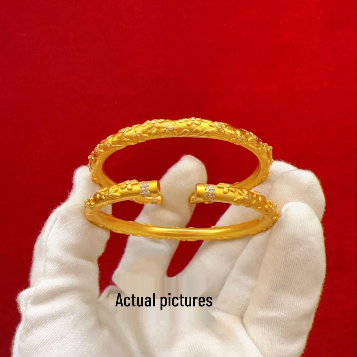 

Golden Rhinestone Sakura Petal Bracelet – Imitation Vietnamese Sand Gold Jewelry