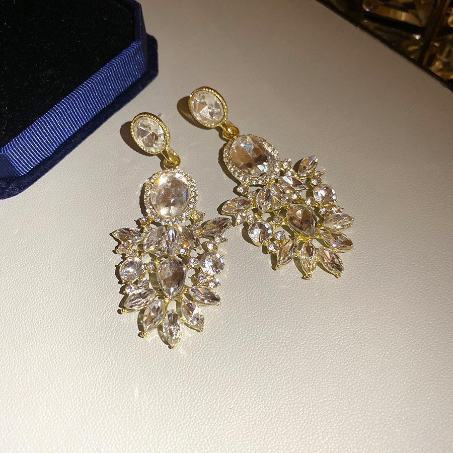 Boucles d'oreilles pendantes ovales incrustées de strass pour femmes, luxe léger, haut de gamme, style rétro palais