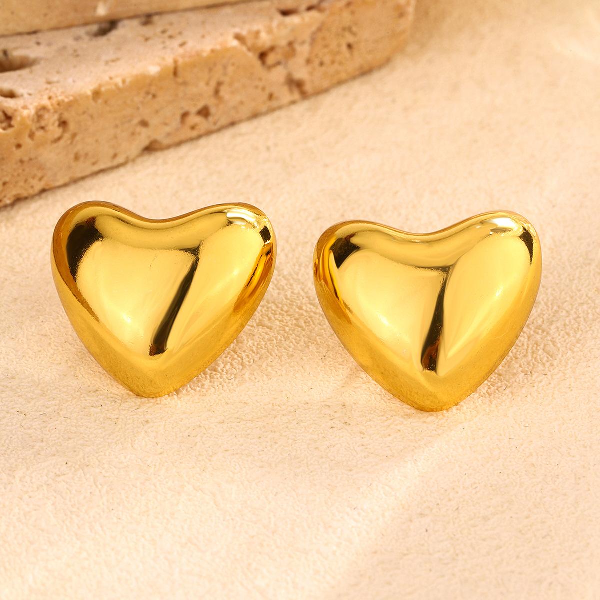 European and American titanium steel jewelry European and American oval wings water drop peach heart texture earrings