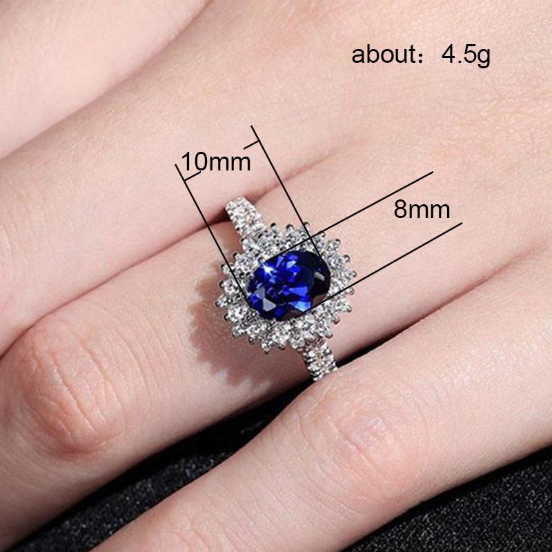 Bague d'anniversaire de mariage Huitan avec Zircone cubique bleu taille ovale Bijou de luxe Cadeau de Saint-Valentin Bagues de mode pour femmes