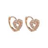 Hollow Love Ear Buckle Dámské lehké luxusní Niche Ins Sladké náušnice Náušnice pro dojíždění ve tvaru srdce