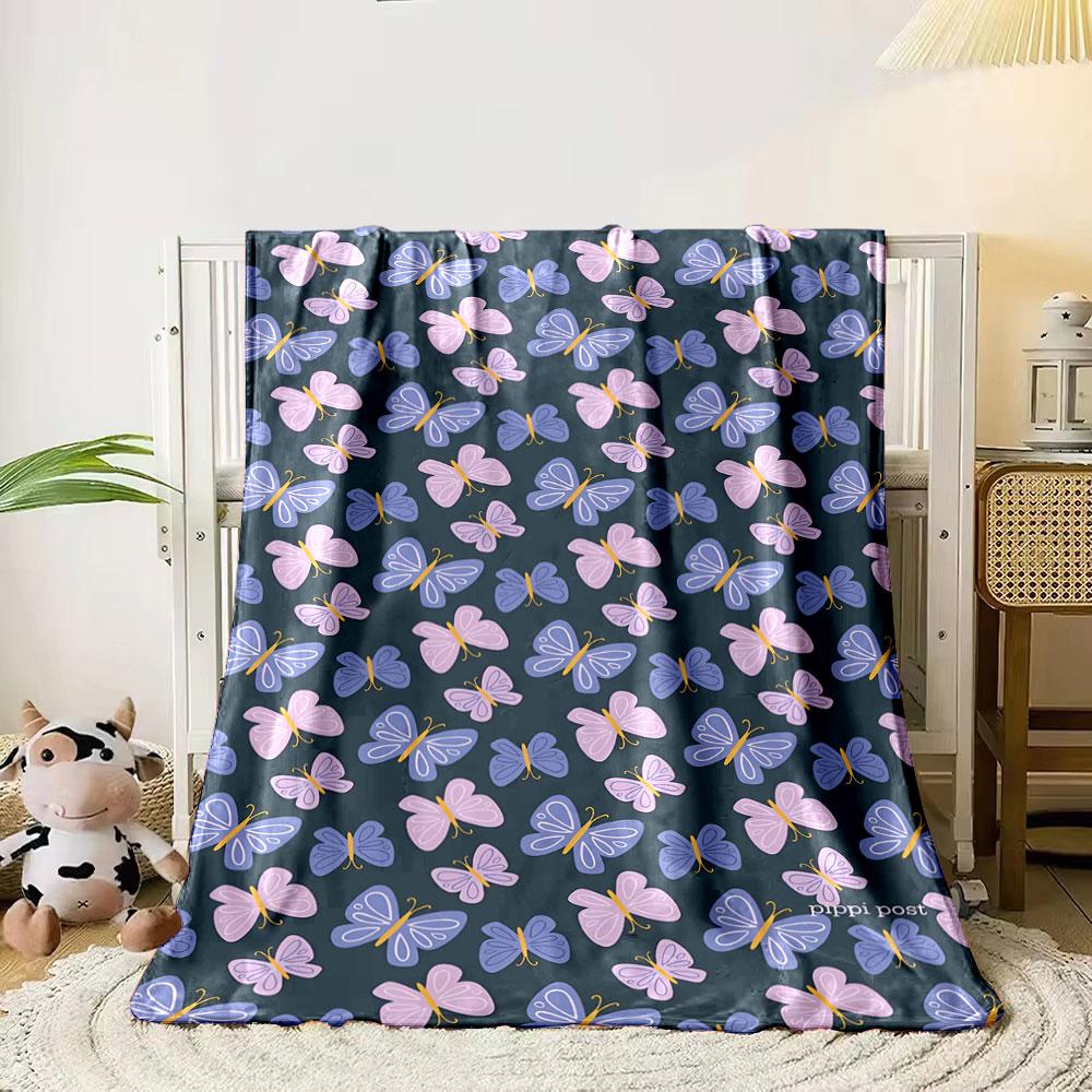 

Pink and purple butterflies with yellow accents on a dark background. for all seasons blanket lunch break throw gift 80cm x 120cm
