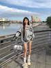 American-Style Oversized Off-Shoulder Sweater: Letter Print, Long Sleeve, Casual Loose Fit for Women In Early Autumn.