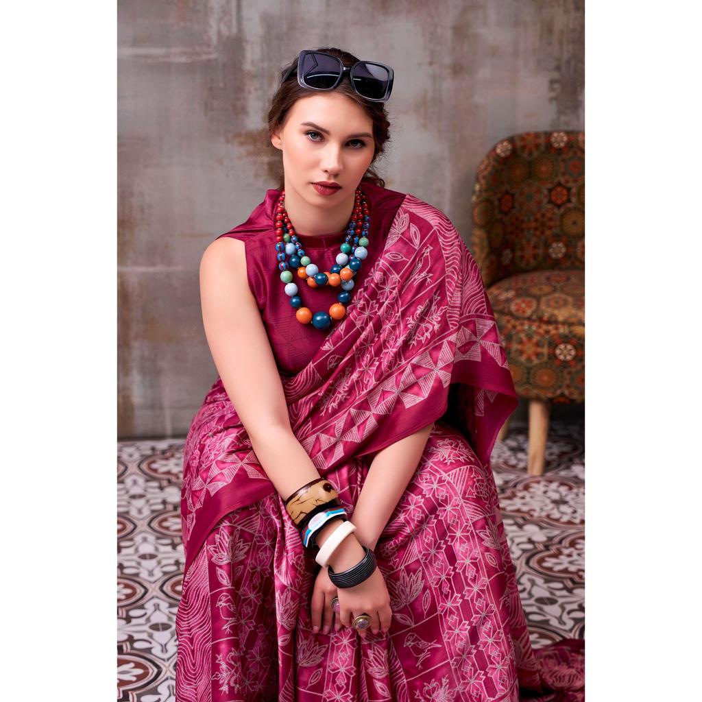 Elegance defined — draped in timeless grace with a floral & geometric printed saree that speaks style in every fold.