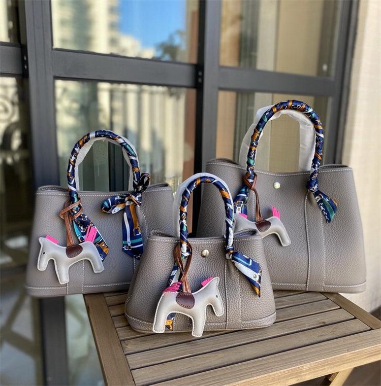 New Bag European and American Popular Women's Bag Garden Bag Canvas Shoulder Strap Portable Shoulder Messenger Bag Cowhide Bag