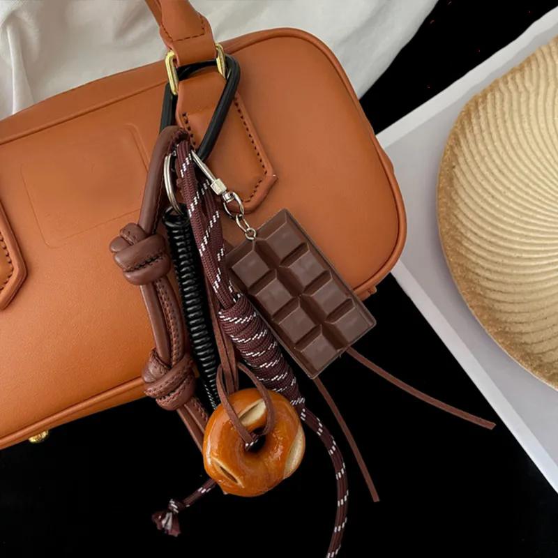 Llavero de cuerda tejida con pan pequeño de agua alcalina, colgante para bolso, decoración, piezas y accesorios para bolsos