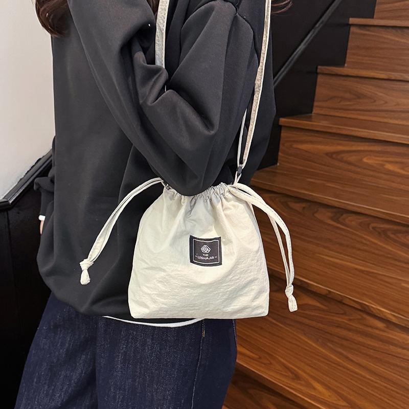 Mobile phone bag women's simple versatile drawstring messenger bag trendy brand shoulder bag leisure sports nylon bag