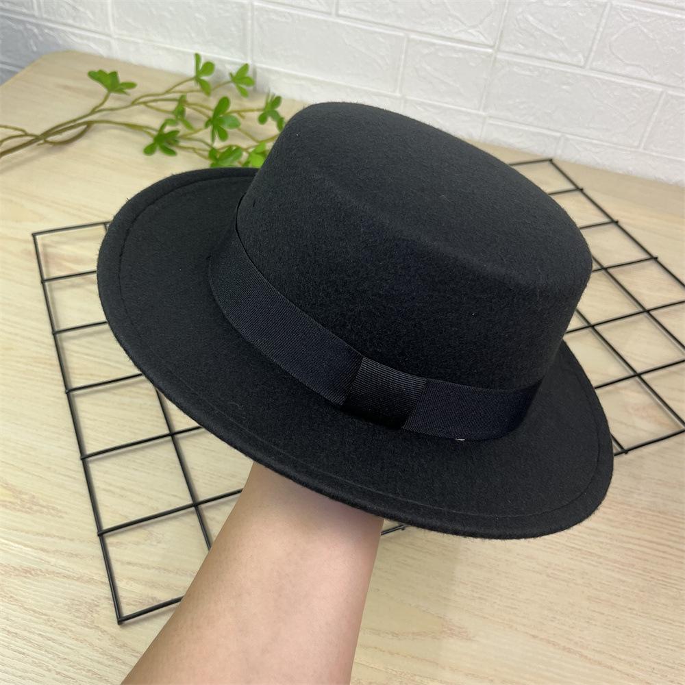 Simple black strap flat top woolen top hat autumn and winter woolen hat men's and women's hats flat edge retro British gentleman's hat