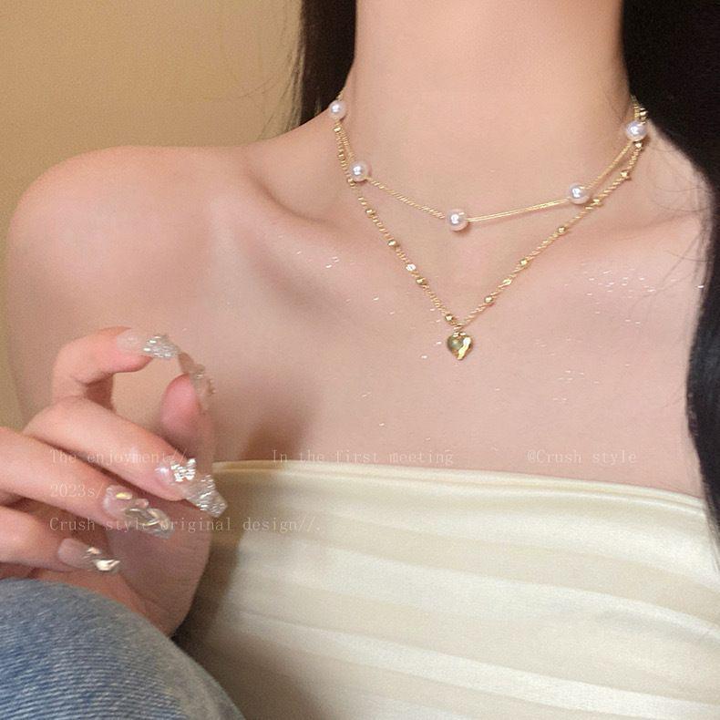 Elegancki Warstwowy Naszyjnik Serce z Pereł - Francuski Lekki Luksusowy Choker dla Kobiet, Delikatny i Wykwintny Łańcuszek na Obojczyk