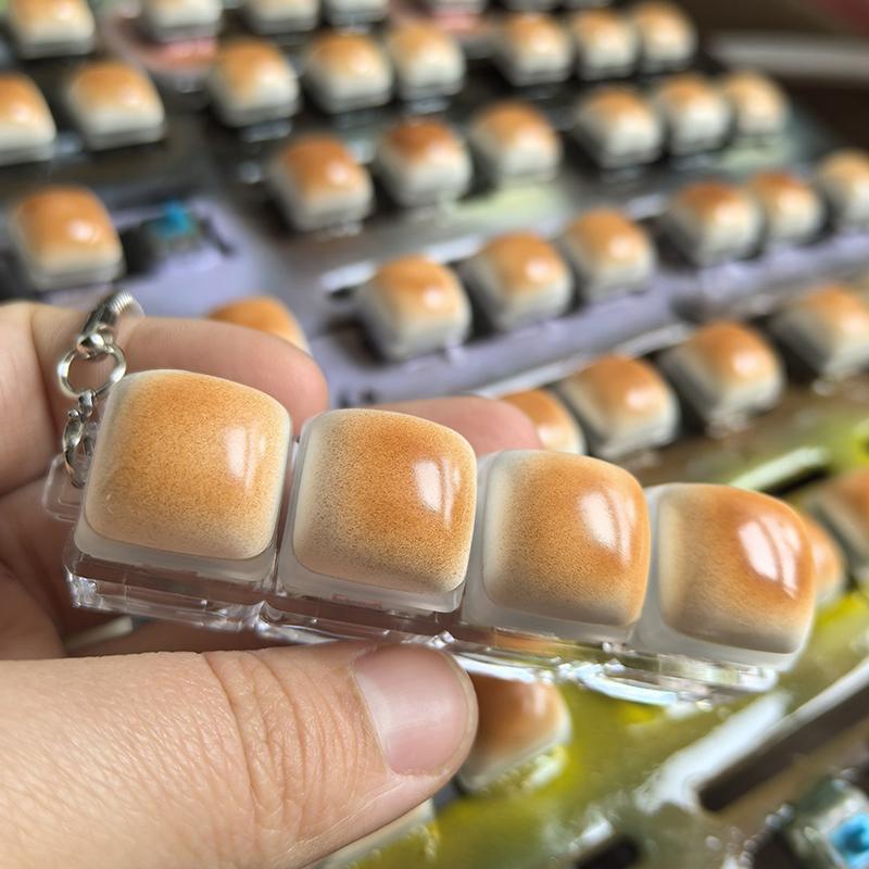 Duonos formos klavišo dangtelis Streso malšinimo clicker raktų pakabukas Mechaninės klaviatūros mygtukas Atpalaiduojantis piršto galiuko raktų pakabukas