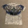 Moda estiva uomo europea e americana stampa teschio con lettere T-shirt comoda e traspirante con scollo rotondo top da esterno per strada
