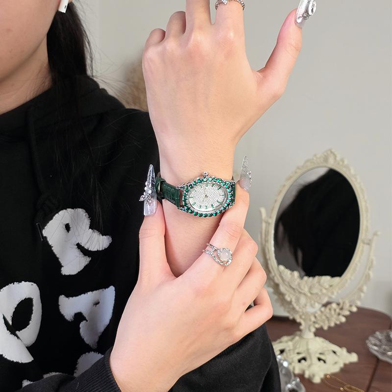 Full Diamond Emerald Watch Women's Full Diamond Goose Egg Light Luxury Niche Design Oval Dial Temperament Versatile Watch