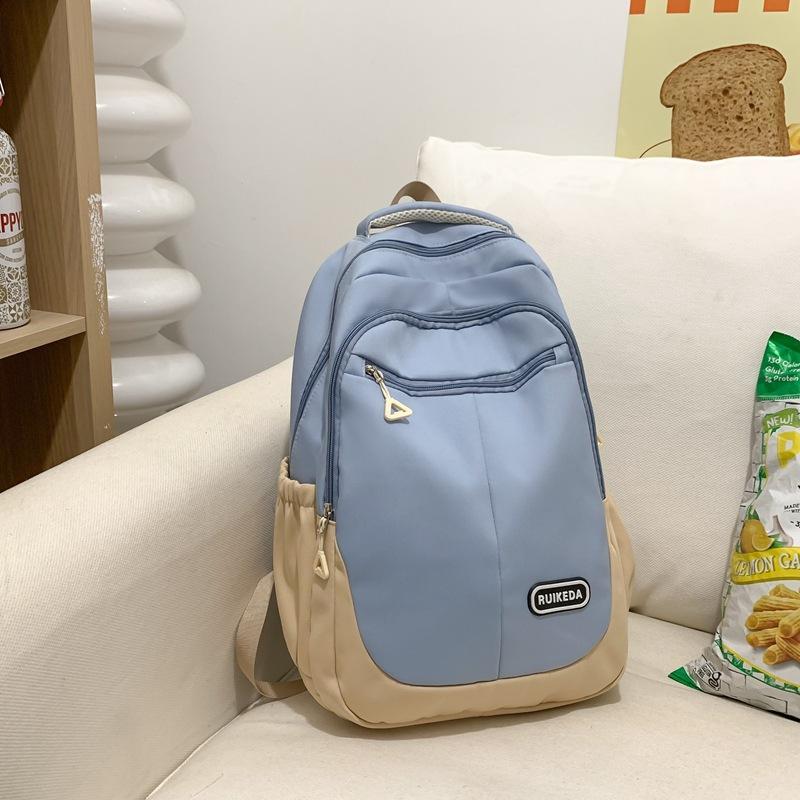 

New backpack contrasting colors, junior high school and high school students schoolbag port large-capacity college student backpack синий