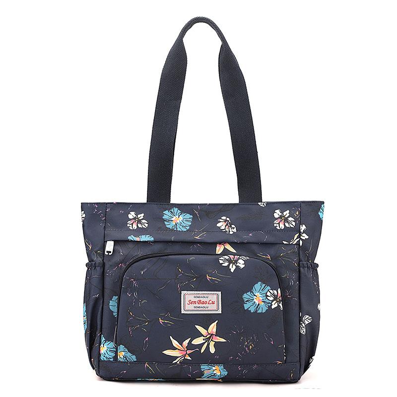 

New casual women s shoulder bag large-capacity travel anti-splashing light printed mother handbag tote women s bag