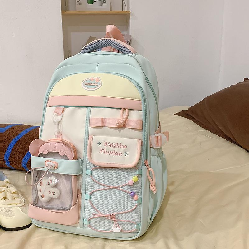 Japanese new high-value, fresh and sweet contrasting colors splicing junior high school students backpack women's lightweight backpack