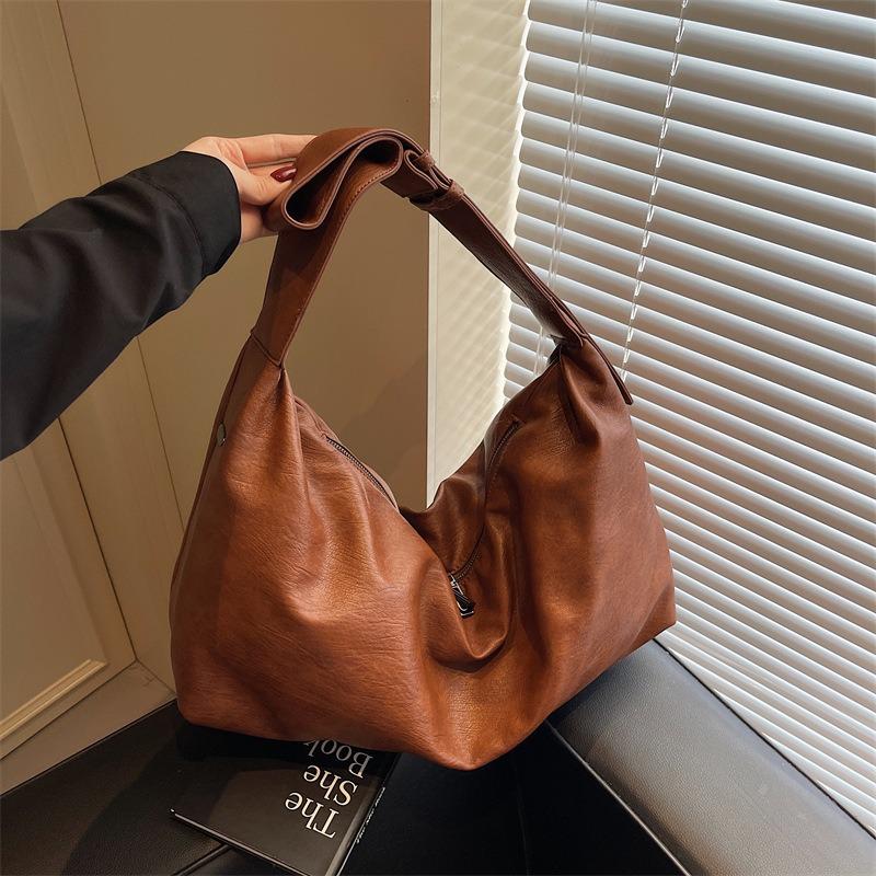 Retro Achseltasche neue einfache Mode Trend große Kapazität Pendler tragbare Schulter Umhängetasche Damen