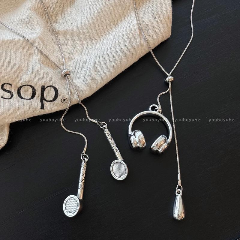 Silver long earphone pendant necklace fashionable and versatile 2026 new sweater chain autumn and winter niche high-end accessories