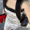 Pure desire style temperament polka dot suspender dress women's summer new design sense splicing waist showing thin long skirt tide