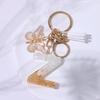 Chic White Tassel Letter Keychain with Resin Epoxy Pendant - Stylish Ornament for Bags