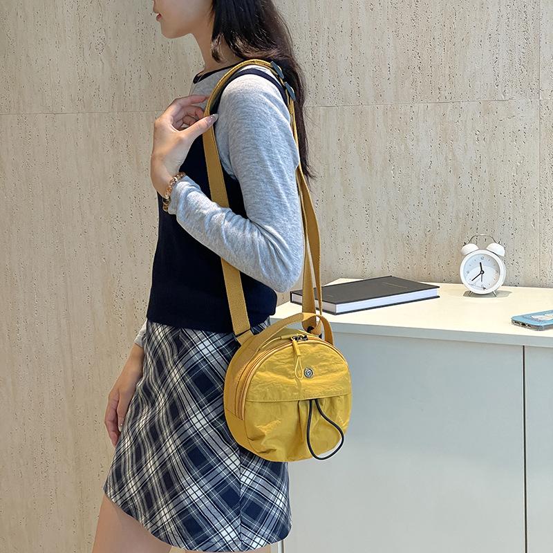 Casual Nylon Cloth Crossbody Bag Women's 2025 New Light Commuter Small Round Bag Drawstring Simple Portable Shoulder Bag