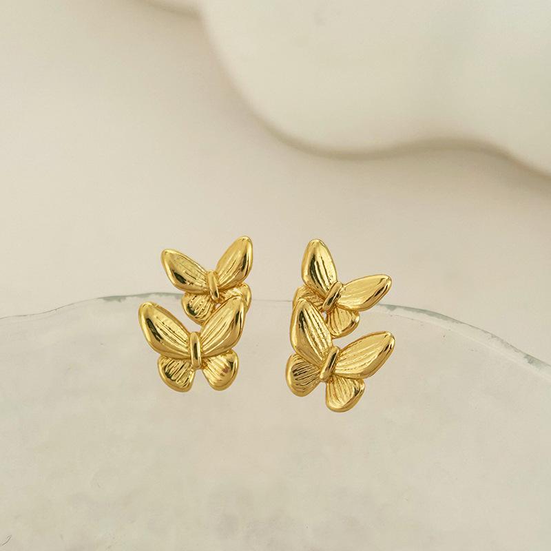 Minimalistische Doppel-Schmetterling-Ohrringe: Elegante High-End Damen-Stecker mit modischem Design