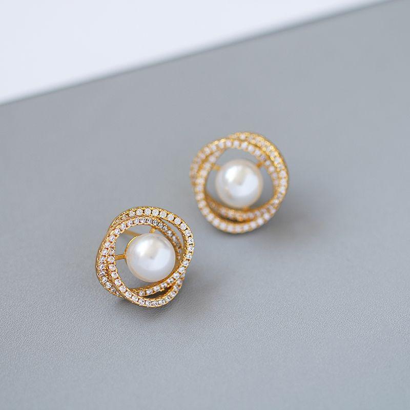 

Niche Gold-Plated Camellia Women s Ear Studs Pearl Earrings 1 pair of spiral stud earrings, 925 silver needle