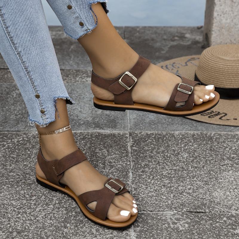 Zehensandalen in Übergröße mit flachem Absatz und Einzelriemen mit Schnalle - Damenschuhe