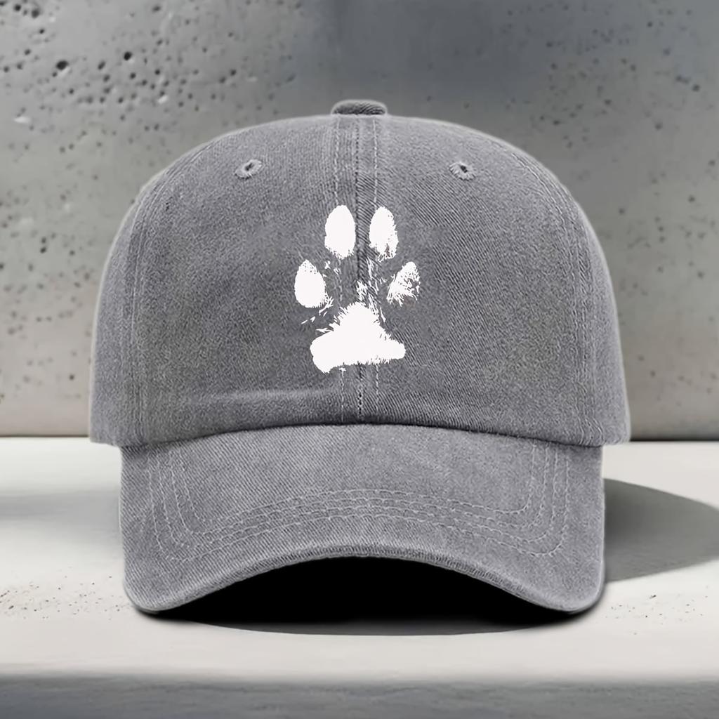 A Baseball Cap Featuring a White Blurry Paw Print Design Suitable for Outdoor Activities And Hiking with a Vintage Washed Look