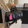 Fashionable PU Embossed Women's Handheld Travel Bag - Large Capacity Carry-on with Wet/Dry Separation for Business and Fitness.