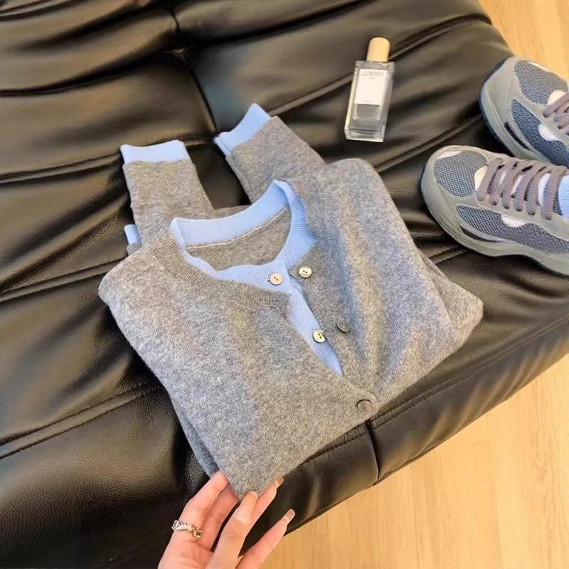 Early autumn new fake two pieces contrasting colors thin temperament knitted cardigan thin top women's long-sleeved design sense niche