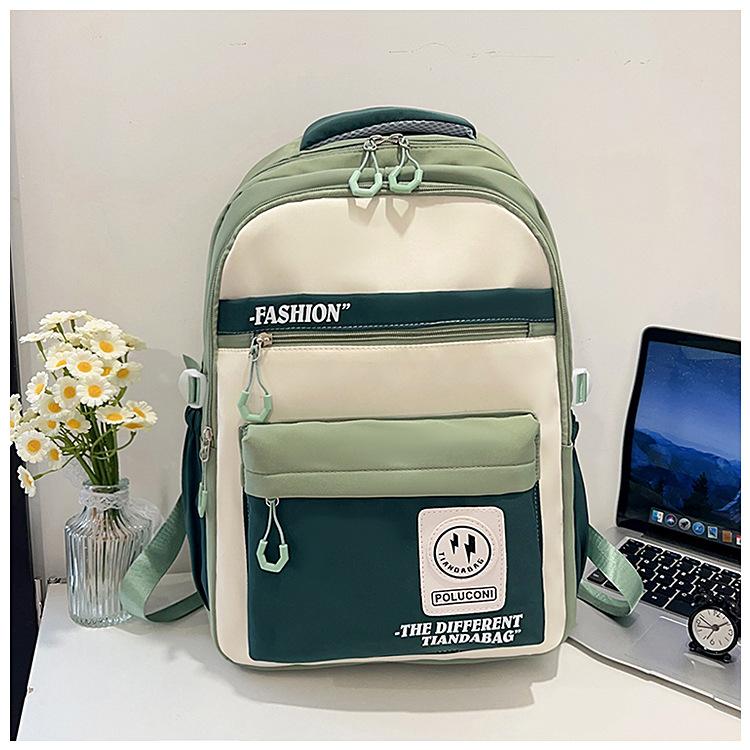 Hot-selling retro tooling wind contrasting color backpack male and female junior high school students versatile tide large-capacity schoolbag