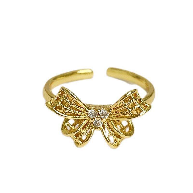 Mittelalterlicher Stil Gold Retro Schleife Hohlöffnung Ring Licht Luxus High Sense Nische Design Zeigefingerring