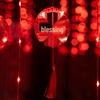 Spring Festival LED Red Lantern Ornaments: Solar Fu Character Colored String Lights for New Year Balcony Decor.