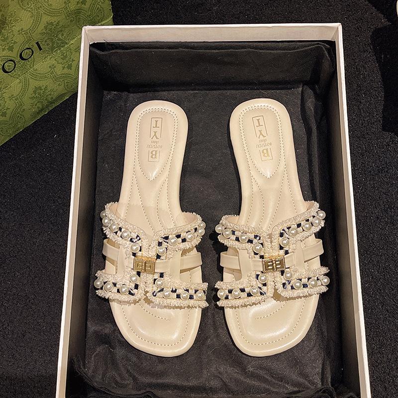 Sommer neue Xiaoxiangfeng flache Hausschuhe Damen tragen Frühling weichsohlige Fee vielseitige Perle Strandsandalen