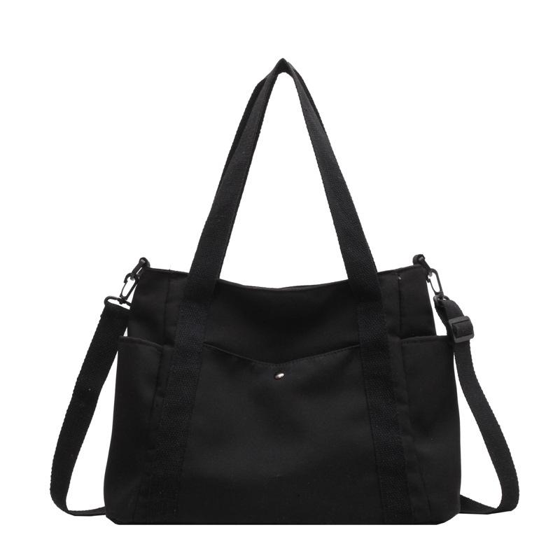 

Женская сумка через плечо новая простая однотонная студенческая портативная косметичка большой вместимости холщовая сумка-тоут для通勤 женщин чёрный