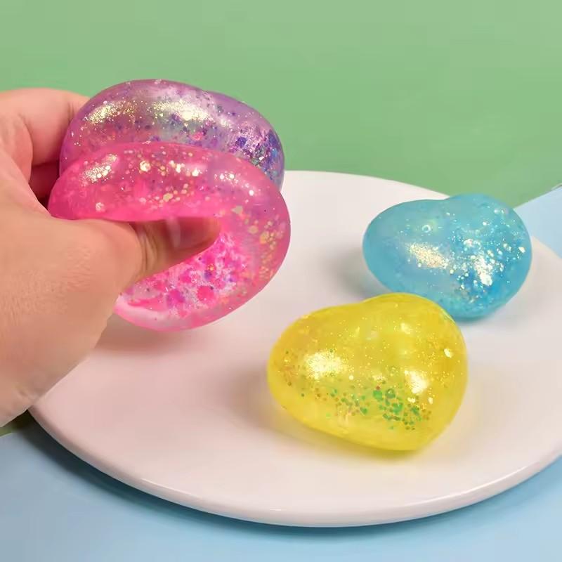 Liebesherz Knetspielzeug Angstlinderung Glitzerpulver Herzform Sensorisches Spielzeug Weicher TPR Dekompressions-Stressball Gastgeschenke