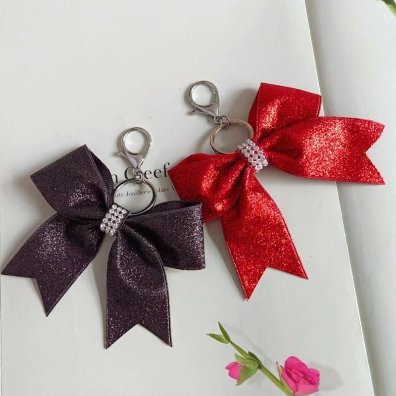 Vielseitiger Cheerleading-Schleifenanhänger Schicker Schlüsselanhänger mit Glitzer und Strasssteinen für Handykette oder Taschendekoration