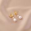 Natural freshwater camellia pearl stud earrings women's niche hollow design sense S925 silver needle simple Korean long earrings