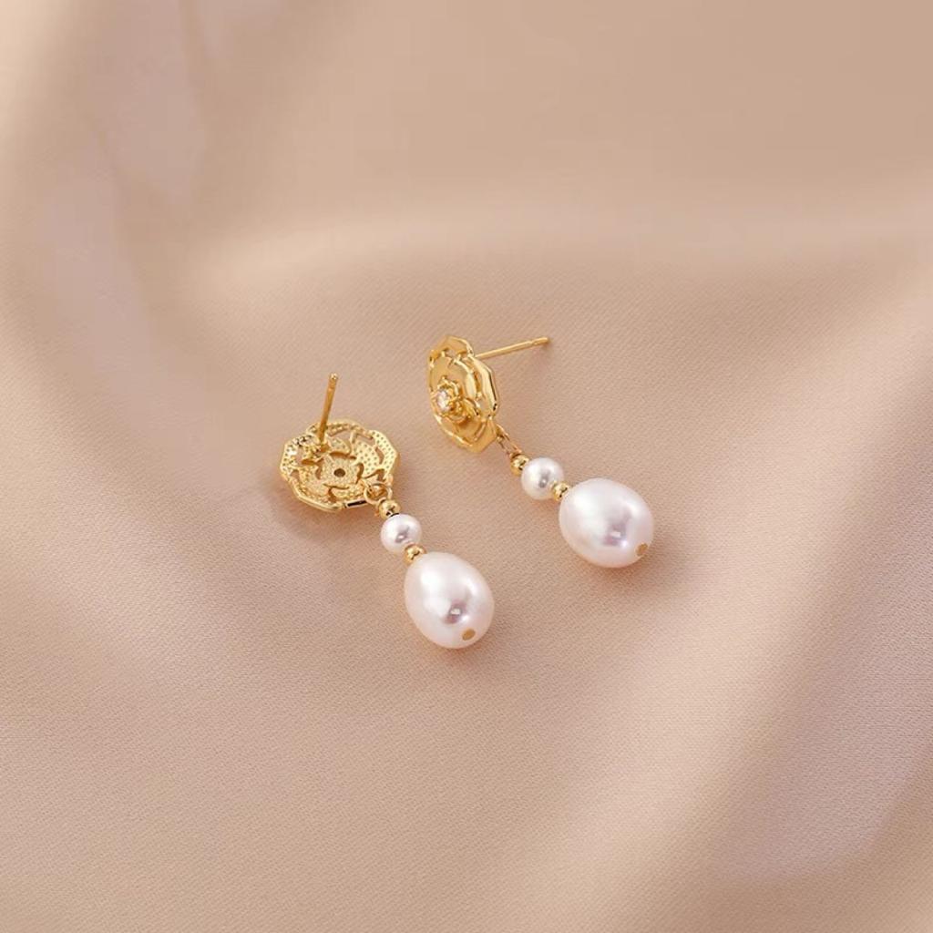 Natural freshwater camellia pearl stud earrings women's niche hollow design sense S925 silver needle simple Korean long earrings