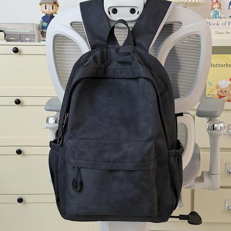 Schoolbag Japanese simple and versatile large-capacity solid color campus schoolbag 1011 summer new light commuter student backpack