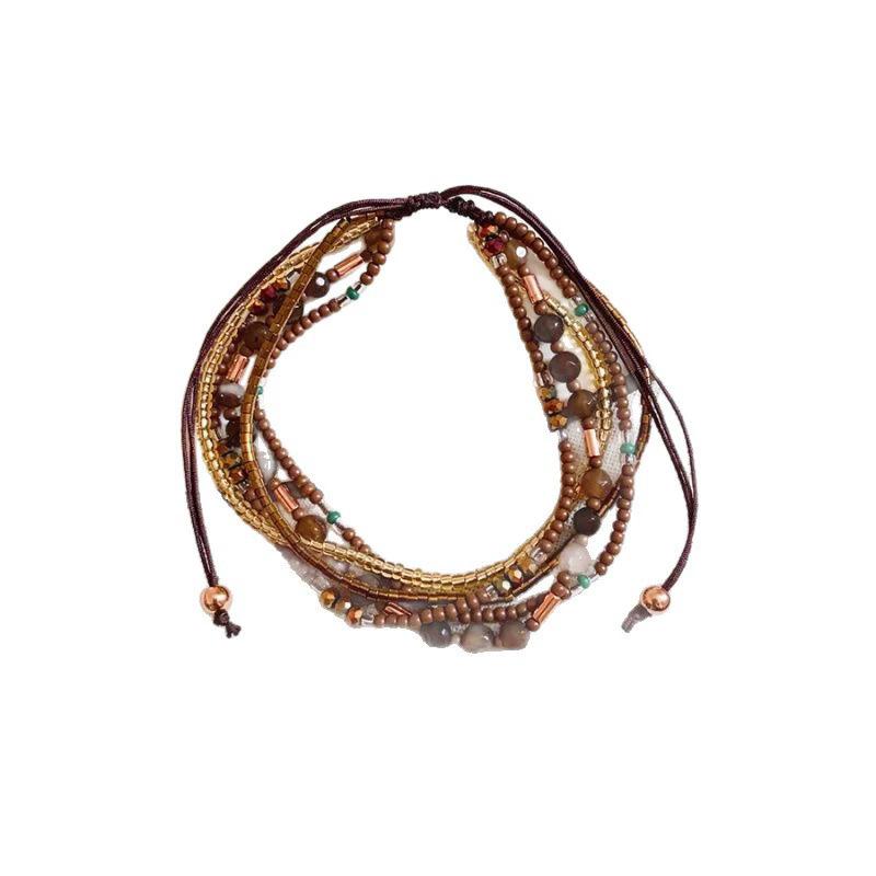 Buntes mehrschichtiges Perlenarmband - Elegantes und raffiniertes Handaccessoire für Damen mit verstellbarem Design