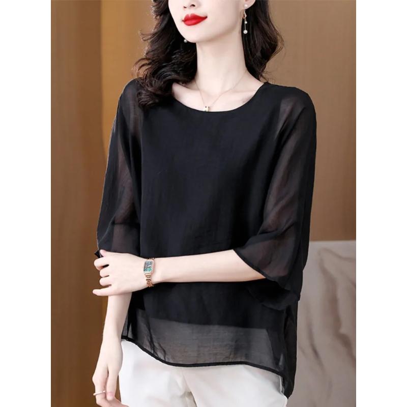 Chemise en mousseline nouveau style couleur unie T-shirt à manches mi-longues pour femme col rond ample haut français