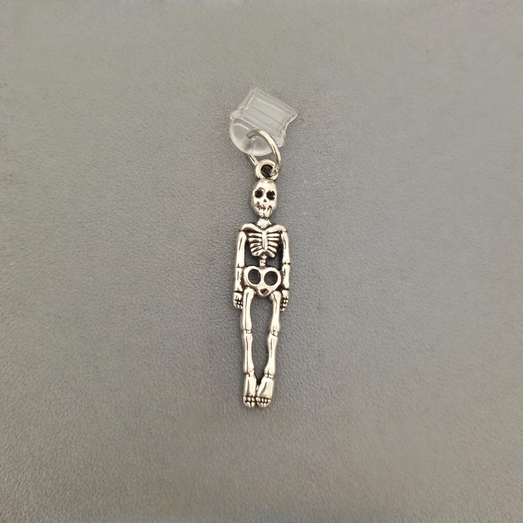 1 Stück Totenkopf-förmiger Handy-Staubschutzstecker, geeignet für iPhone/Typ-C, ausgefallenes Geschenk für Ladeanschluss