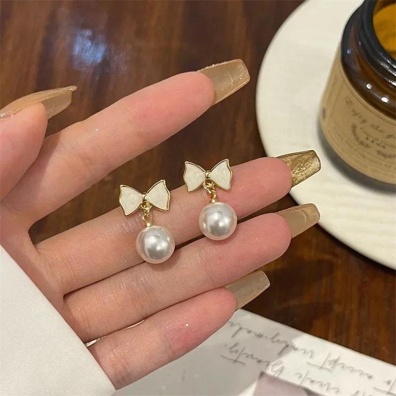 Cute Romantic Bowknot Pearl Earrings for Women Korean Simple Personality Exquisite Pendant Earrings Wedding Jewelry Party Gift