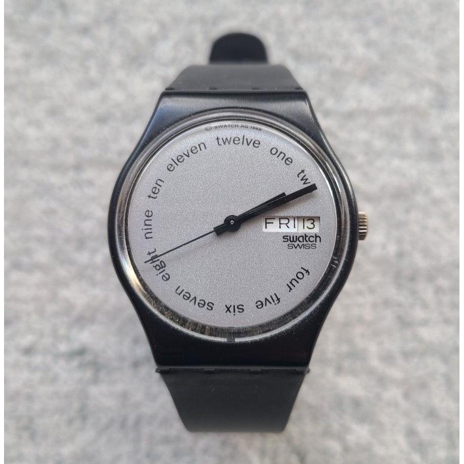 Used vintage 80s Swatch wristwatch 3-hand day-date quartz dial gray black battery replaced