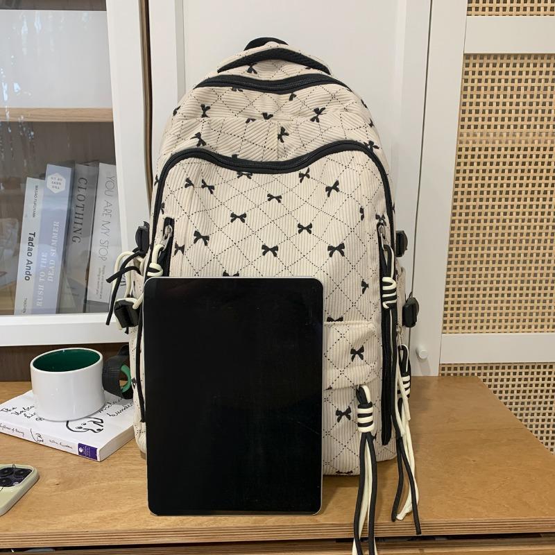 Bow Print Corduroy Backpack Casual Fashion Daily Bag Large Capacity School Bag for Students Minimalist Design Commute Travel with Tassel Accents